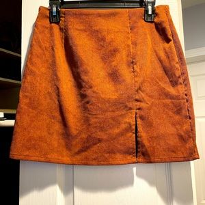 Dark orange/brown corduroy mini skirt with slit